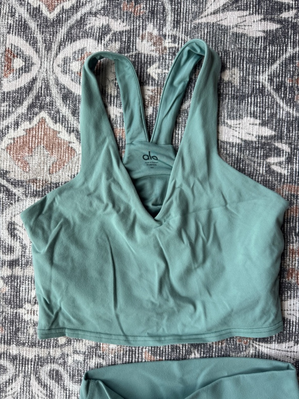 Alo V-Neck Sports Bra in Dusty Teal, size medium
